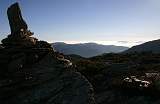  The summit cairn on La Caissenole, looking South West over the sea of clouds towards the Pyrenees.