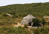  "Romeo and Juliette". Two Capitelles near Faugères. These are shelters constructed of local stone, without mortar, that date from the 17th and 18th centuries. Many of them can be found on the garrigue..