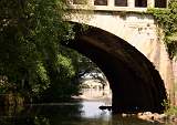  View through the Canal du Midi aqueduct of the River Orb and its bridges